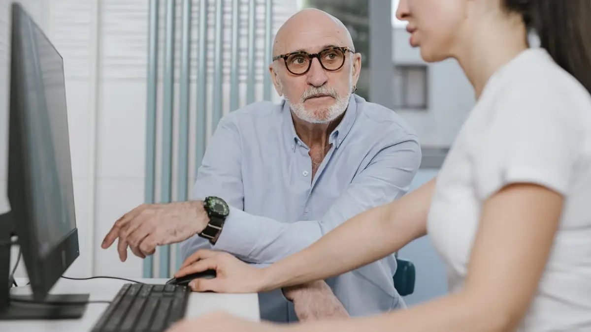 Doctor in a consultation with an older man