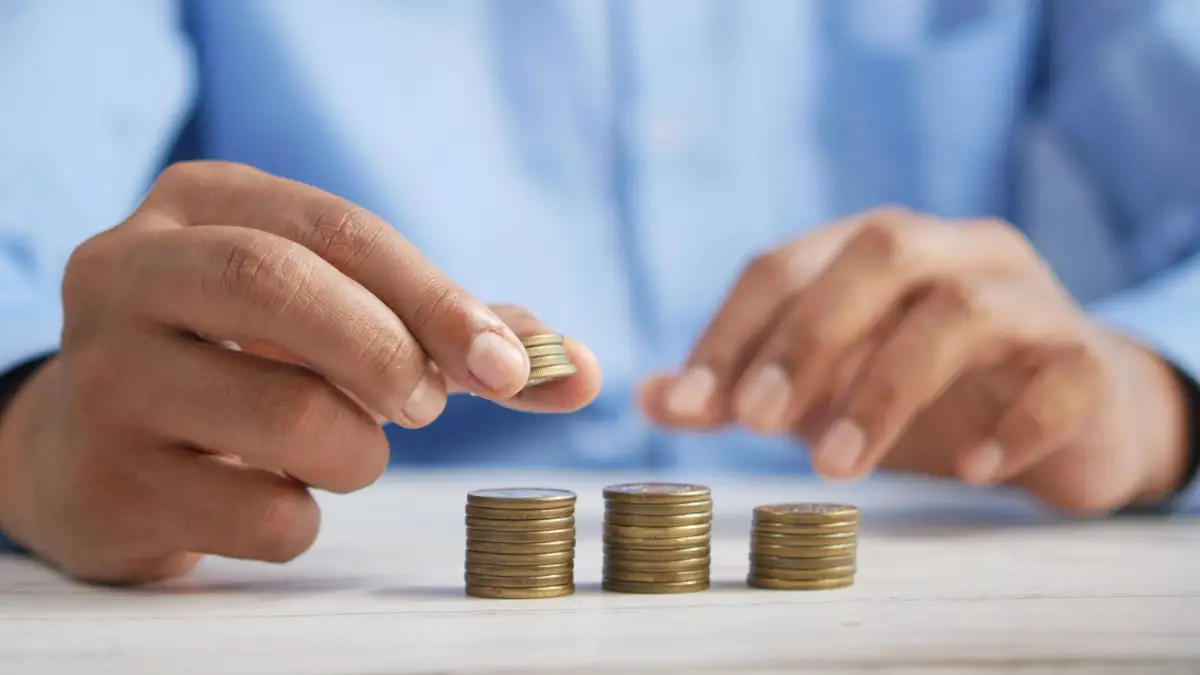 Stacks of coins showing savings growing