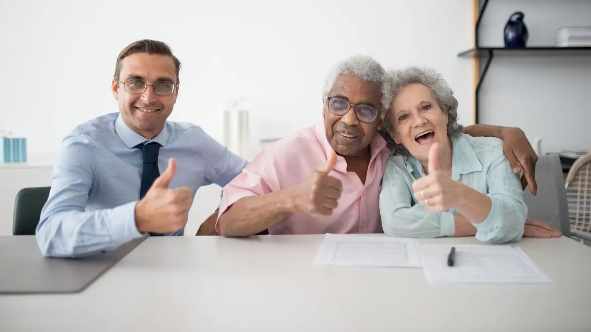 Older couple meeting an advisor about insurance