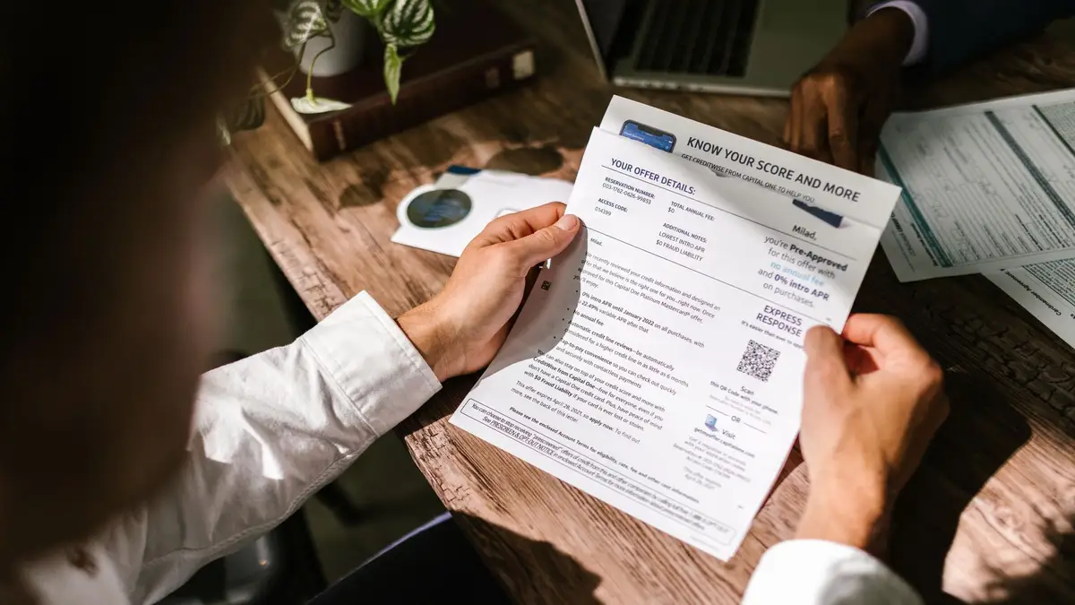 Older man reviewing an investment statement